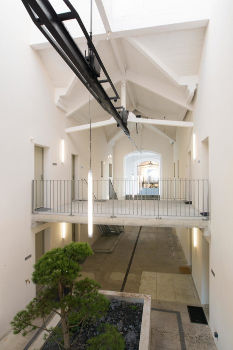 Reconversion d’une usine d’Allumette en logements sociaux à Trélazé par le Cabinet Latitude Immobilière Podeliha Allumetiere Trelaze Latitude Monorail Aiguillages 467x700